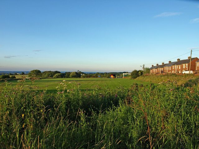 Playing fields, Marley Hill The brick terraced housing of Marley Hill to the right.