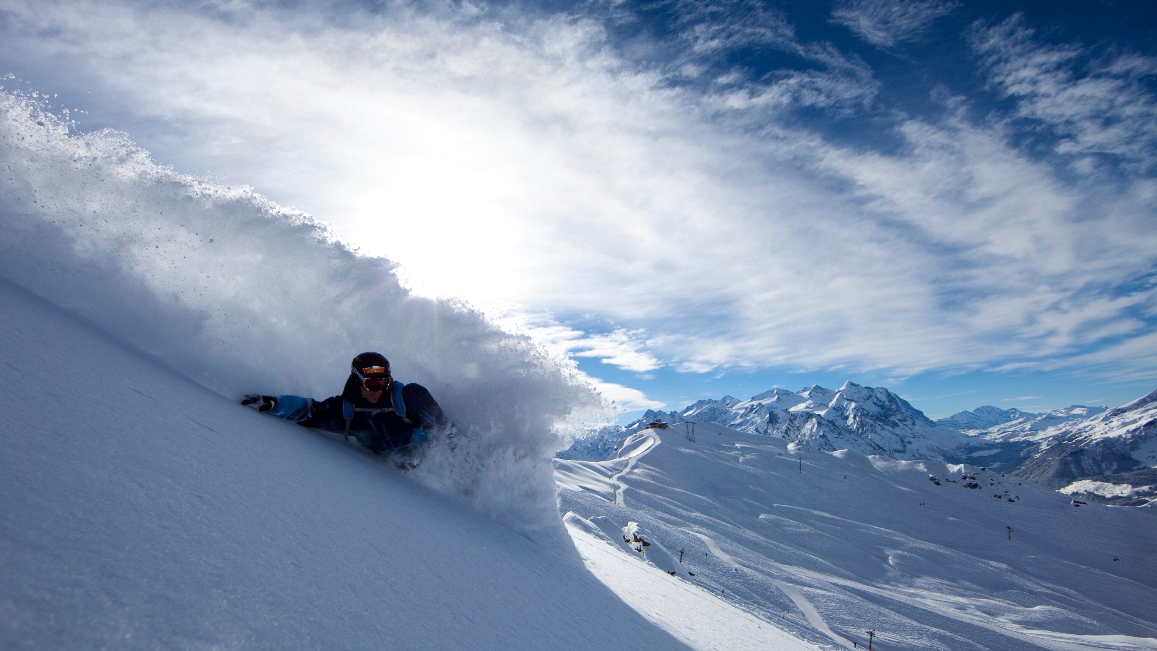 Hasliberg featuring snow and snow boarding as well as an individual male