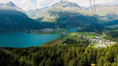 Ride the Surlej Gondola for amazing views of the upper Engadin Valley in Grisons (GraubĂŒnden), and easy access to hiking in the shadow of the Bernina Range. Lake Silvaplana offers opportunities for paddle boarding, canoeing, sailing, and parasailing. #mysummervacation #lifeatexpedia #hiking #mountains #Switzerland