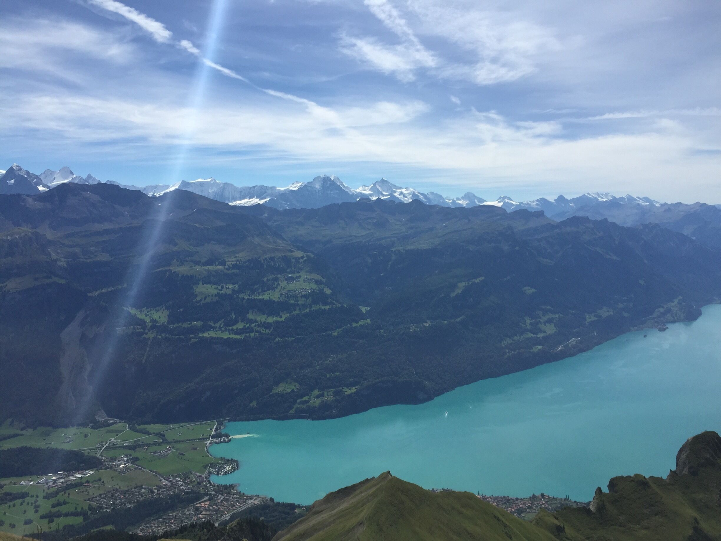 View from the Brienzer Rothorn, lake Brienzer and the alps in the background 