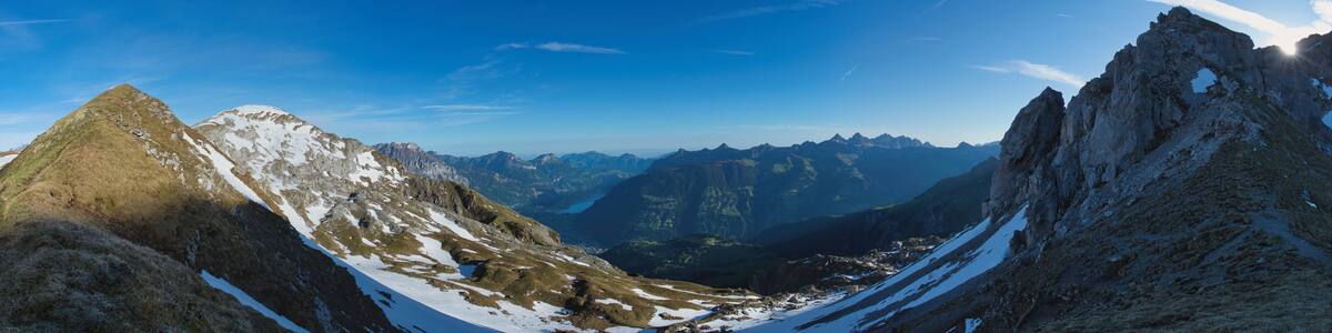 large panorama towards Altdorf in Switzerland in the Alps in spring with beautiful weather and blue sky