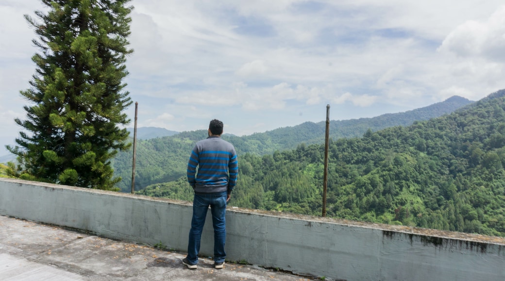 Man enjoying mountain view in San Juancito Fracismo Morazan Honduras Central America