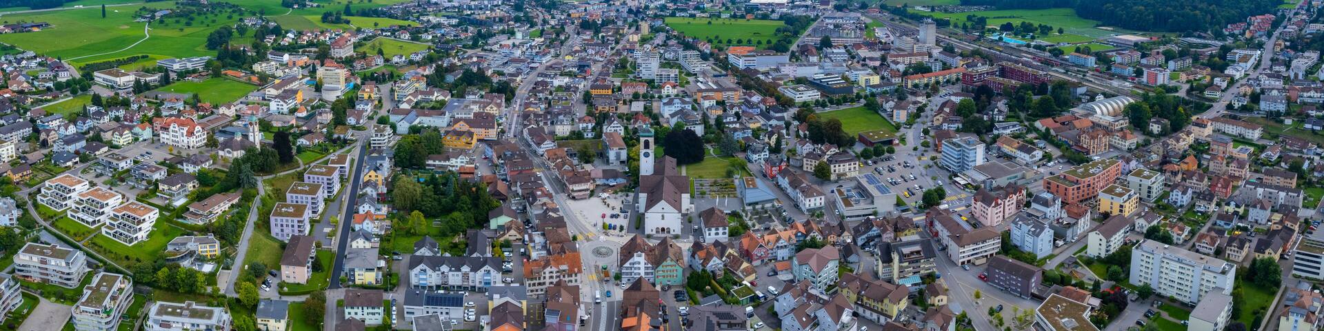 Aerial view around the city gossau in Switzerland on a overcast day in summer.