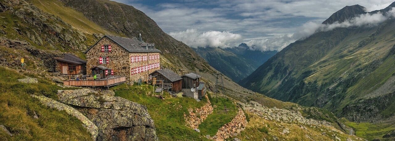 August 2017

Nuernberger Huette, Stubaital, Tirol land, Austria

Nuernberger Huette is one of the huts on the Stubaier Alps Hoehenweg, an 80 km long trekking route. It is located in 2.297 meters altitude and it was originally built in 1886 and it has got its present state in 1962 offering around 140 places for overnight. Stubaier Alps belong to the Central Alps, its peaks rise up to some 3.500 meters and are made of gneiss, shale and on its borders also from limestone Dolomite. Together with many small glaciers, emerald lakes, waterfalls and creeks it gives them an amazing variety of mountain landscapes.