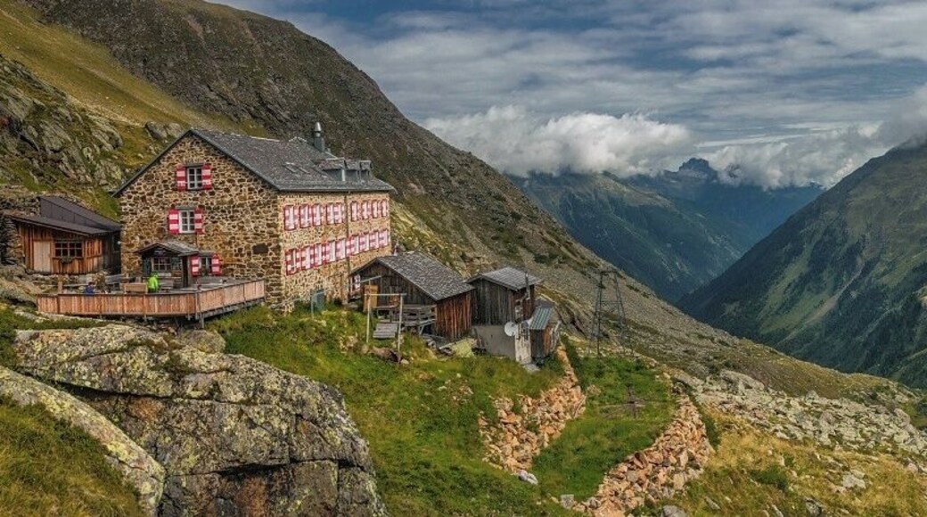 August 2017
Nuernberger Huette, Stubaital, Tirol land, Austria
Nuernberger Huette is one of the huts on the Stubaier Alps Hoehenweg, an 80 km long trekking route. It is located in 2.297 meters altitude and it was originally built in 1886 and it has got its present state in 1962 offering around 140 places for overnight. Stubaier Alps belong to the Central Alps, its peaks rise up to some 3.500 meters and are made of gneiss, shale and on its borders also from limestone Dolomite. Together with many small glaciers, emerald lakes, waterfalls and creeks it gives them an amazing variety of mountain landscapes.