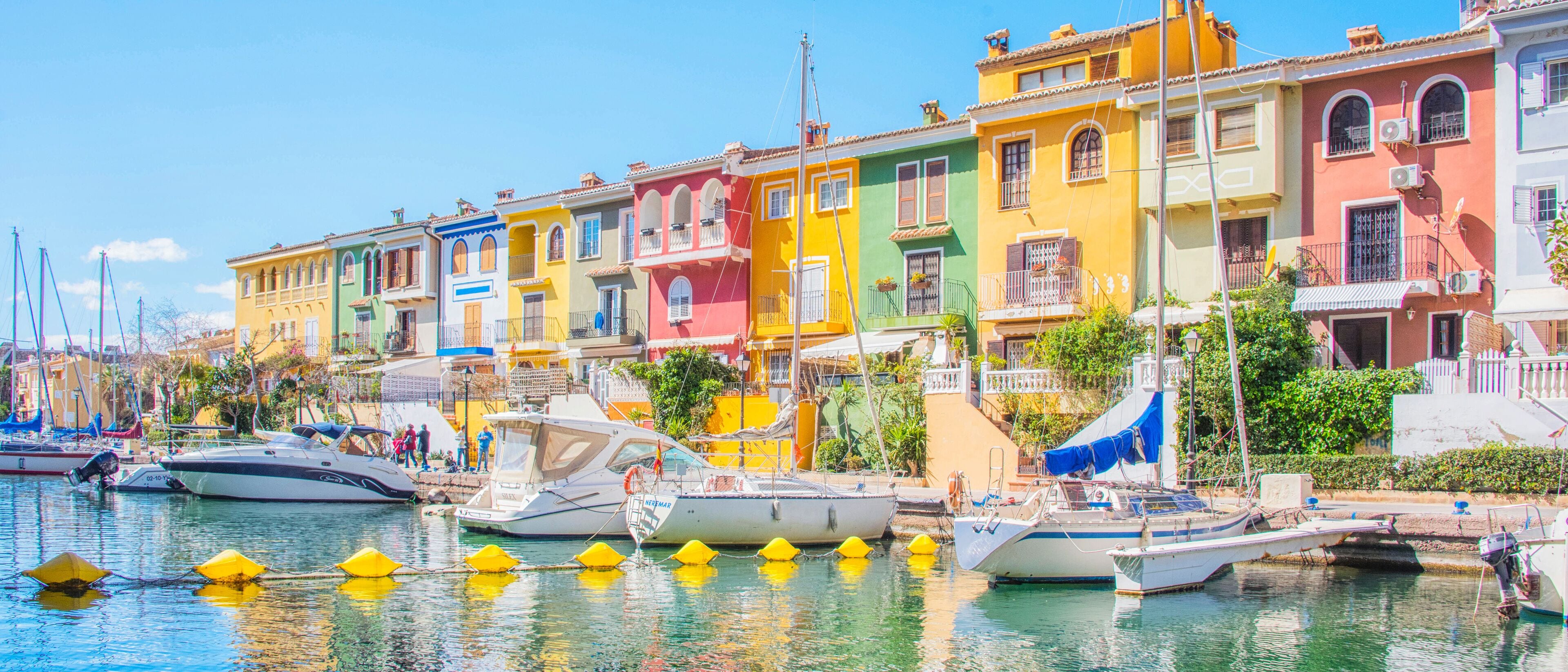 Port Sa Playa, Valencia, Spain - 3/19/2019: Bright sunny day panoramic photo looking at Port Saplaya, Valencia's Little Venice