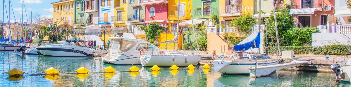 Port Sa Playa, Valencia, Spain - 3/19/2019: Bright sunny day panoramic photo looking at Port Saplaya, Valencia's Little Venice