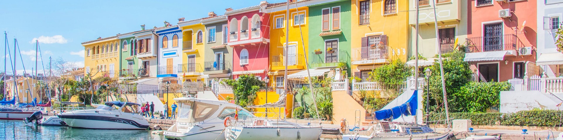 Port Sa Playa, Valencia, Spain - 3/19/2019: Bright sunny day panoramic photo looking at Port Saplaya, Valencia's Little Venice
