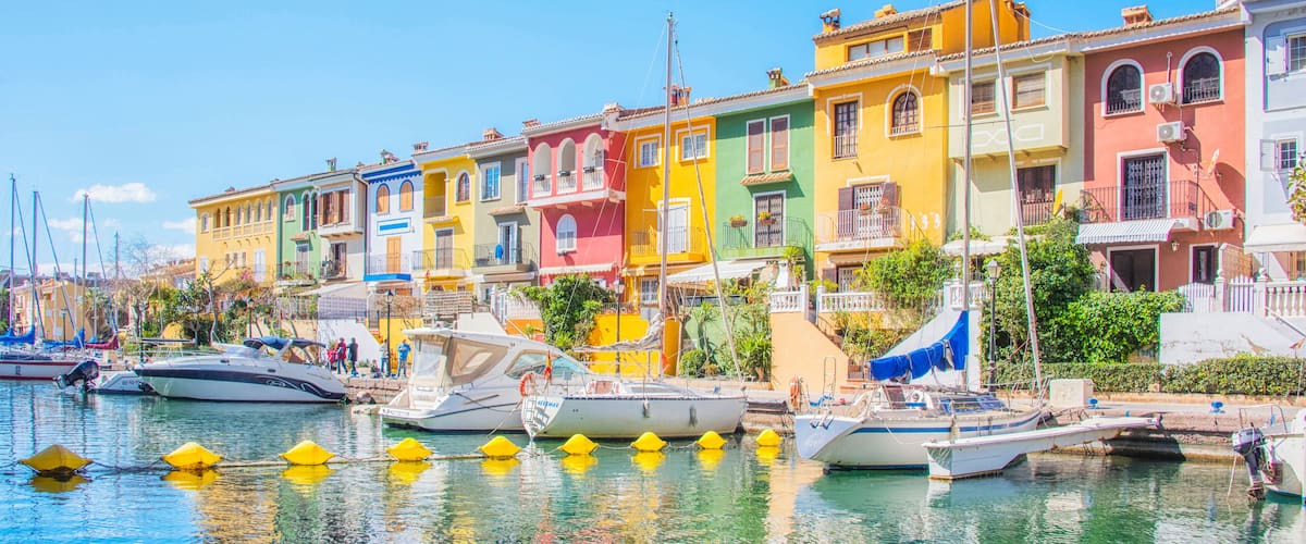 Port Sa Playa, Valencia, Spain - 3/19/2019: Bright sunny day panoramic photo looking at Port Saplaya, Valencia's Little Venice