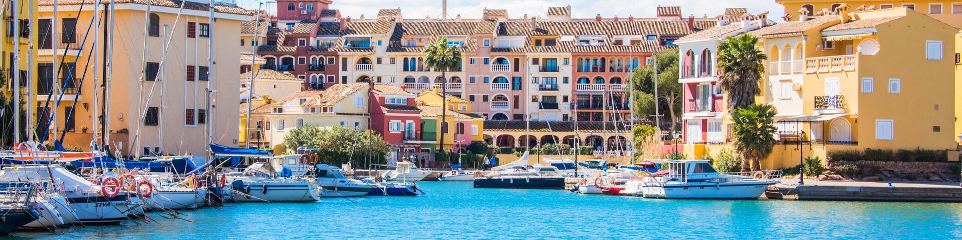 Port Sa Playa, Valencia, Spain - 3/19/2019: Bright sunny day panoramic photo looking at Port Saplaya, Valencia's Little Venice