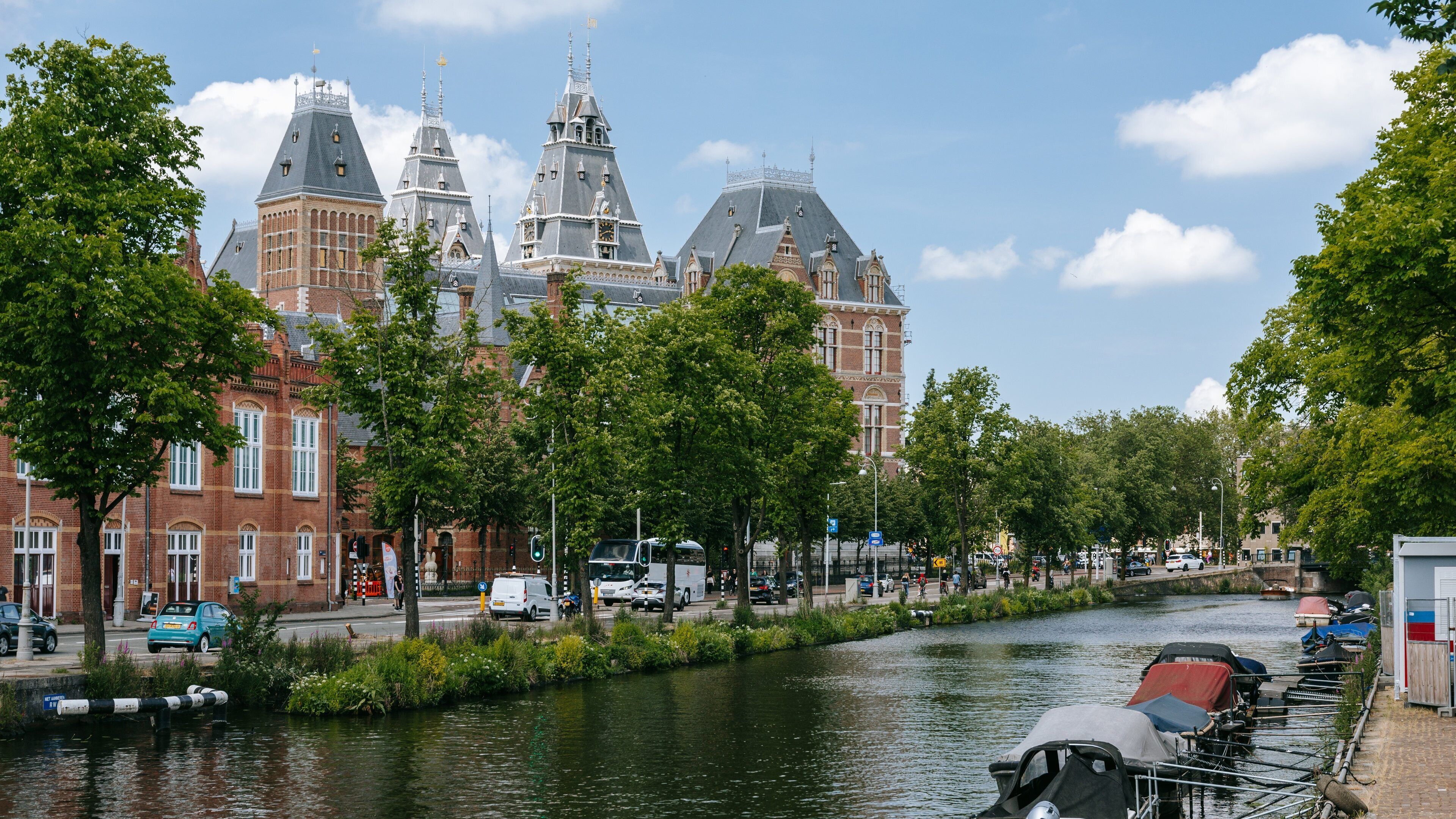 Rijksmuseum which includes a river or creek and heritage architecture