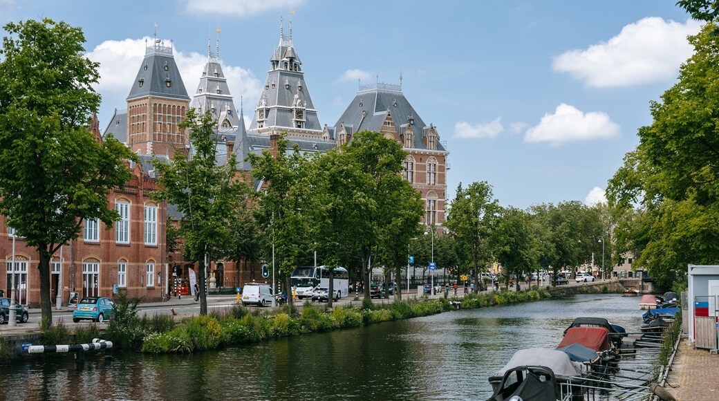 Rijksmuseum which includes a river or creek and heritage architecture