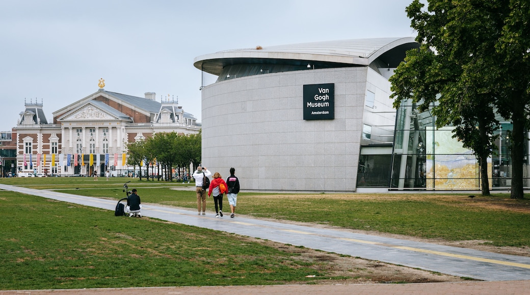 Van Gogh Museum showing a garden as well as a small group of people