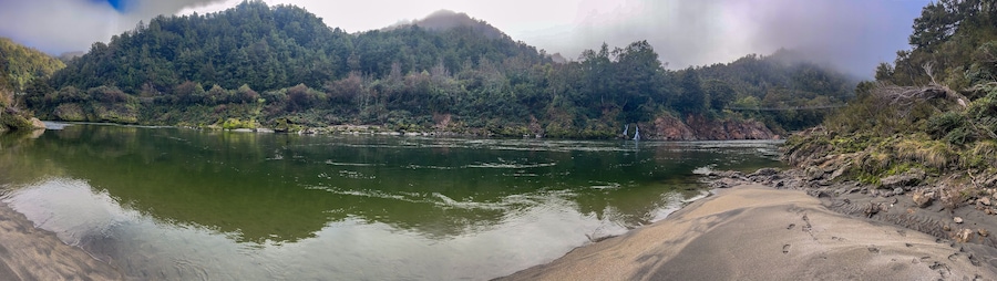 The Buller river flowing through the forest covered upper Buller Gorge near the longest suspension bridge in NZ