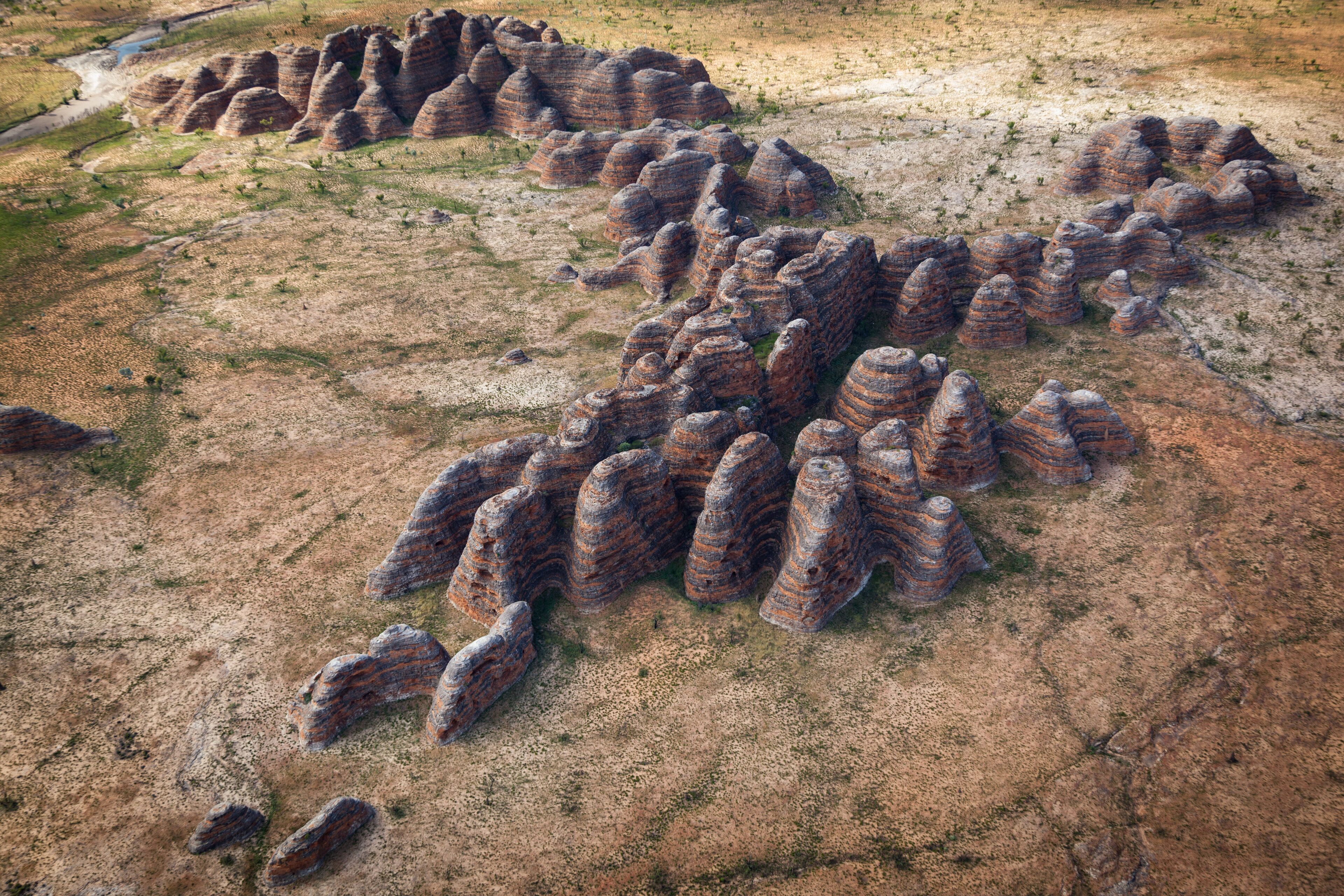 Outlier domes of the Bungle Bungle Range in the Purnululu World Heritage Listed National Park when viewed from a helicopter is a very special experience and a visual feast.