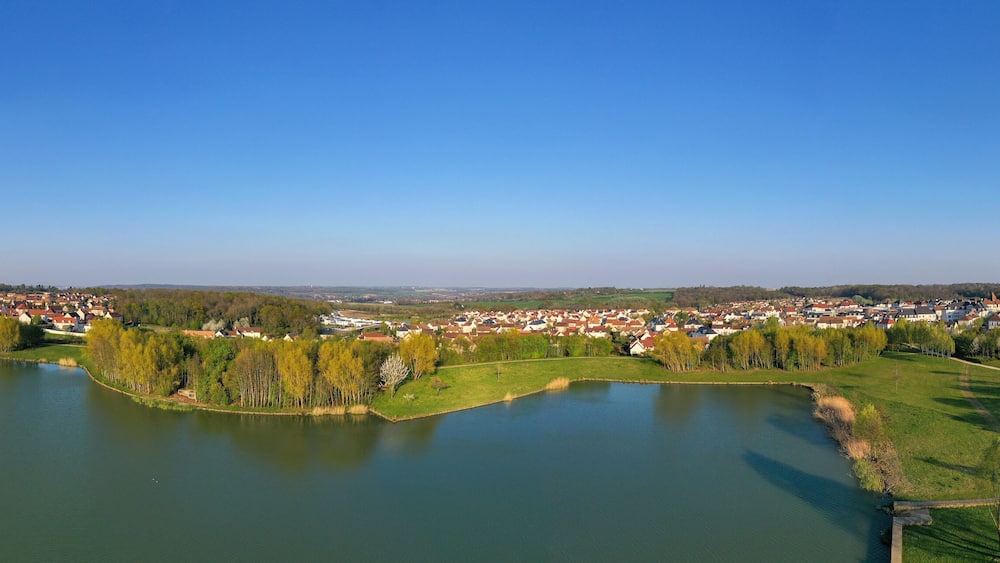 Panoramic aerial view of Lake Magny-le-Hongre