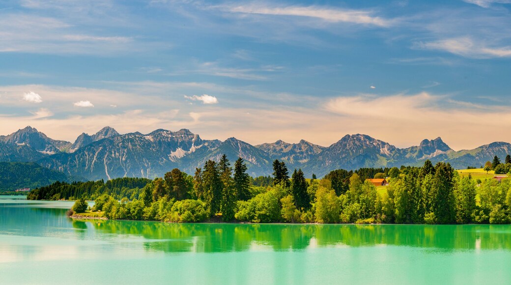 panoramic landscape in Bavaria with mountain range and lake