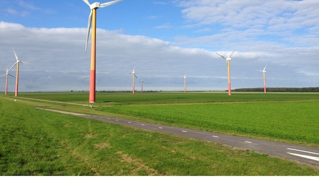 Apart from providing green energy, modern windmills provide modern and postcard like landscapes.