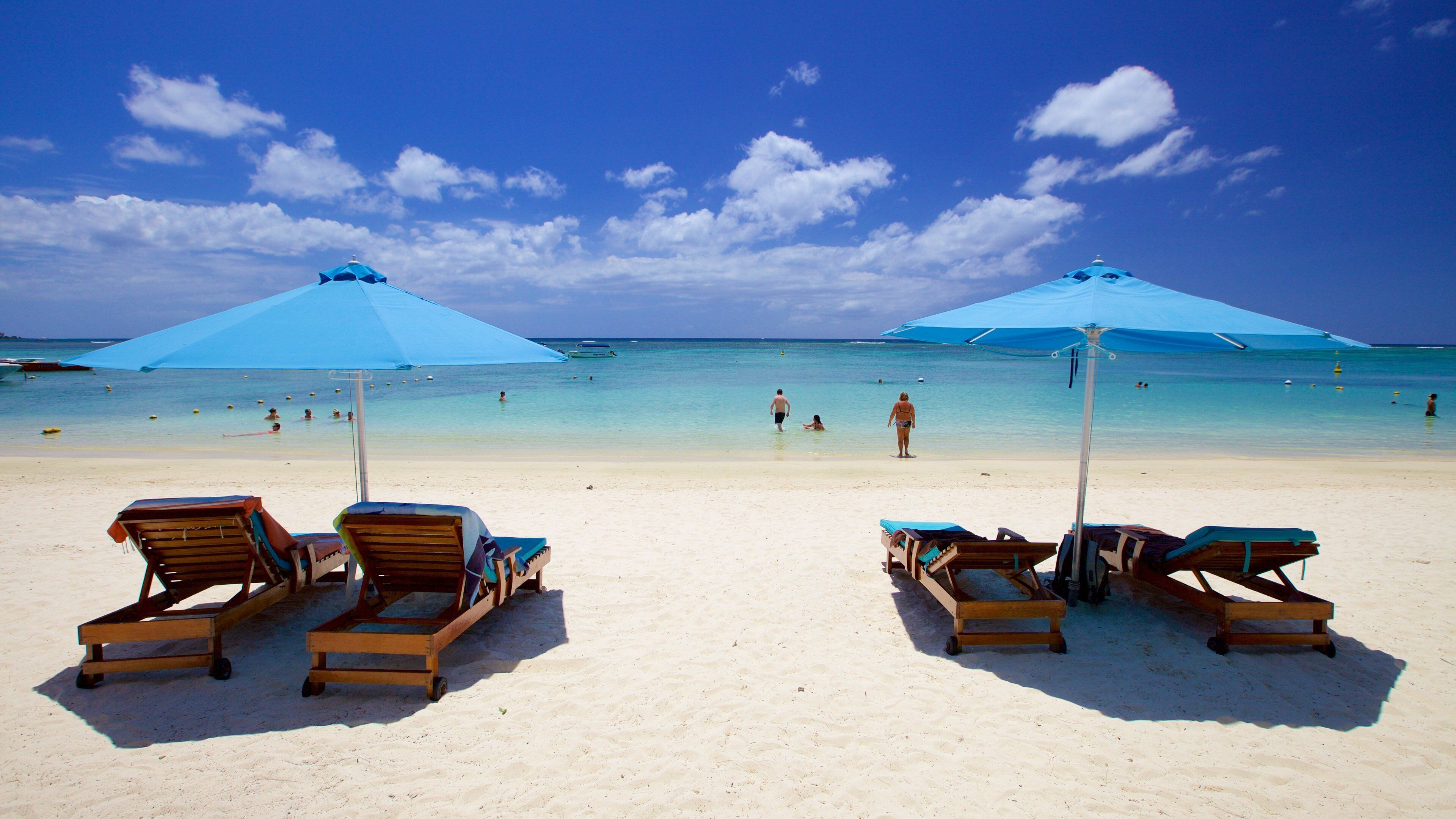 Trou aux Biches which includes a luxury hotel or resort and a beach