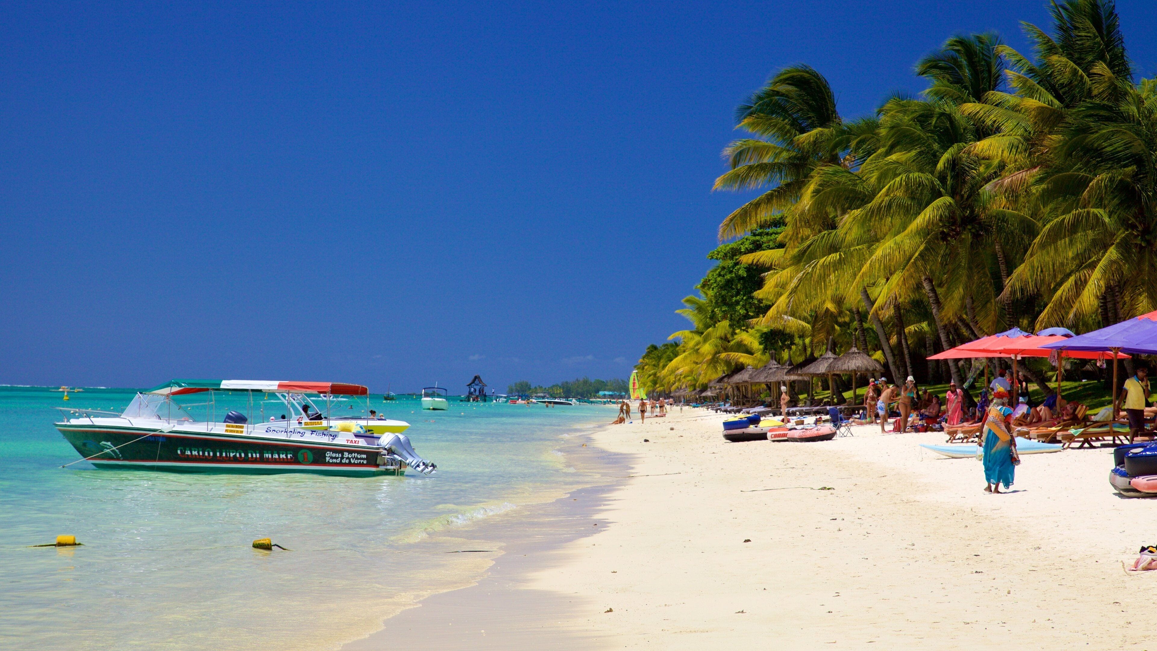 Trou aux Biches which includes a beach, boating and a luxury hotel or resort