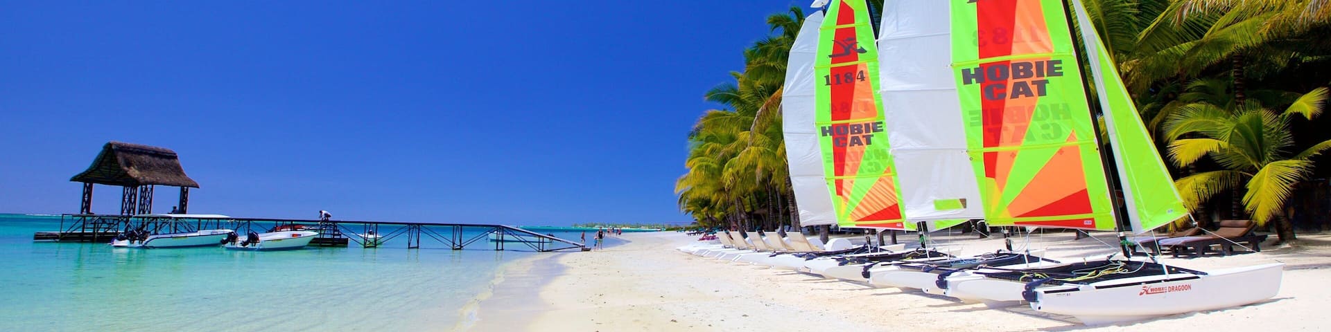 Trou aux Biches which includes a beach and sailing