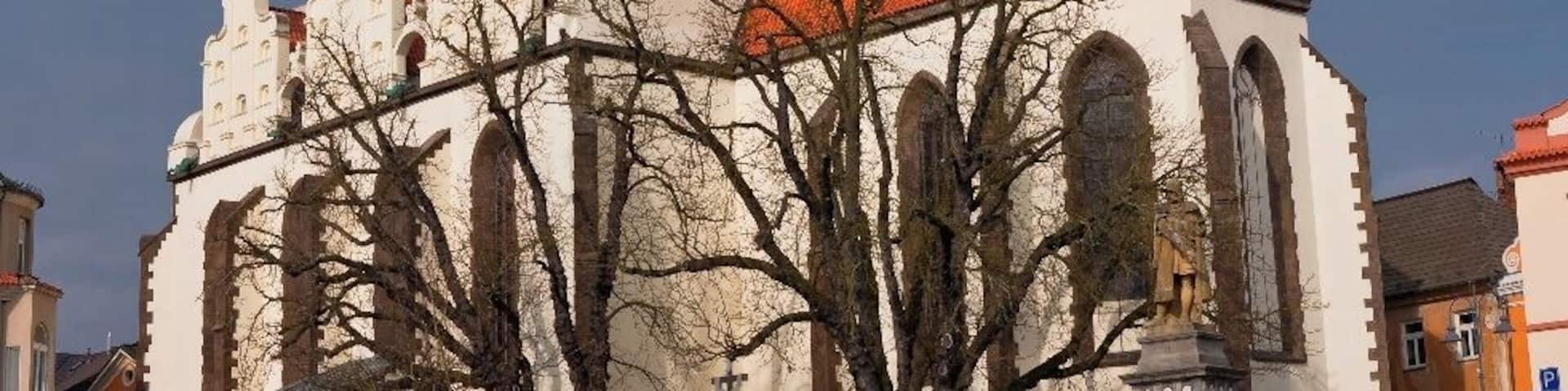 February 2016
Church of Transfiguration on the Mount Tabor, Tábor, Czech republic
The mighty Roman Catholic church was built in 1440-1552 in late Gothic style and it is dedicated to the miracle of Transfiguration as described in the New Testament and painted in the main altar of this church.
The church and its tower were rebuilt several times due to fire damages and wars. The gables were changed in Rennaisance style in 1559. The tower has gothical base and baroque dome from 1677. It is 78 metres high and has 250 steps. There was a whole Neogothic redesign made in 1896-98 by Josef Mocker (the architect of Prague Castle Cathedral finalization and of several Prague Towers).
The frequent fires resulted in appointment of the tower guardian who had to blow his horn each 15 minutes in the night in order not to get asleep.
The Transfiguration refers to a miracle which happened to Jesus travelling to Mount Tabor with apostles Peter, James and John. Jesus was transfigured and became radiant speaking with Moses and Elijah. They tell him He is a beloved son of God and the apostles should listen to him as he is his Messenger, the bridge between humans and God, heaven and earth.