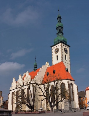 February 2016
Church of Transfiguration on the Mount Tabor, Tábor, Czech republic 
The mighty Roman Catholic church was built in 1440-1552 in late Gothic style and it is dedicated to the miracle of Transfiguration as described in the New Testament and painted in the main altar of this church. 
The church and its tower were rebuilt several times due to fire damages and wars. The gables were changed in Rennaisance style in 1559. The tower has gothical base and baroque dome from 1677. It is 78 metres high and has 250 steps. There was a whole Neogothic redesign made in 1896-98 by Josef Mocker (the architect of Prague Castle Cathedral finalization and of several Prague Towers). 
The frequent fires resulted in appointment of the tower guardian who had to blow his horn each 15 minutes in the night in order not to get asleep. 
The Transfiguration refers to a miracle which happened to Jesus travelling to Mount Tabor with apostles Peter, James and John. Jesus was transfigured and became radiant speaking with Moses and Elijah. They tell him He is a beloved son of God and the apostles should listen to him as he is his Messenger, the bridge between humans and God, heaven and earth.