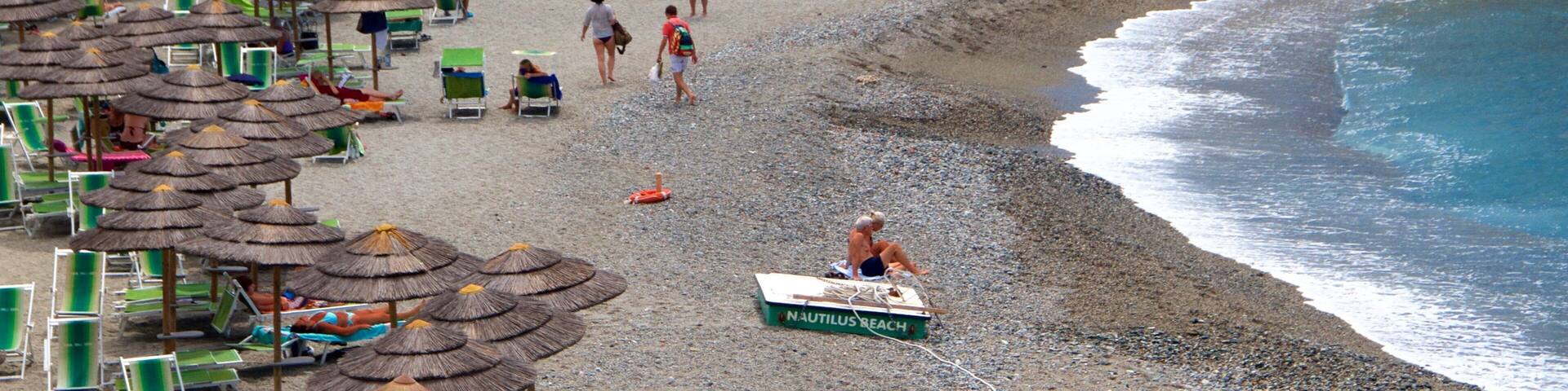 Celle Ligure showing a sandy beach, a luxury hotel or resort and general coastal views