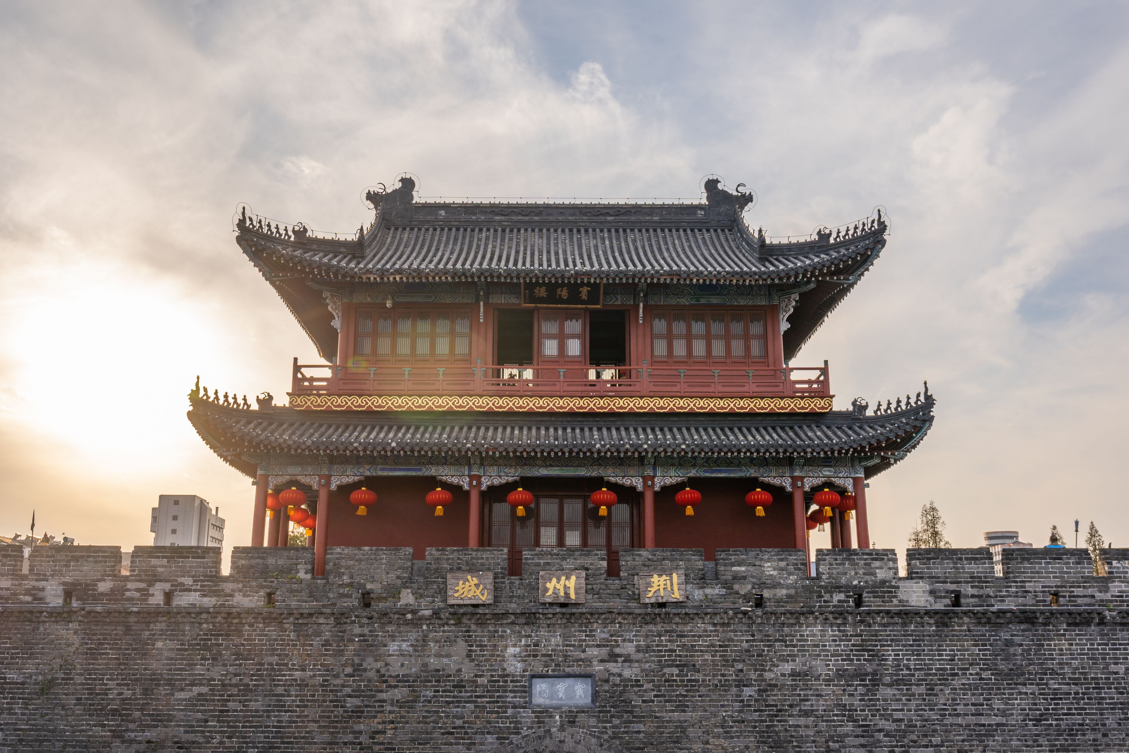 Traditional facade of buildings, exterior of buildings,loated Jingzhou China.Close-up of historic buildings.There china letters on building is"Jingzhou gate" builded in the Three Kingdoms Period.
