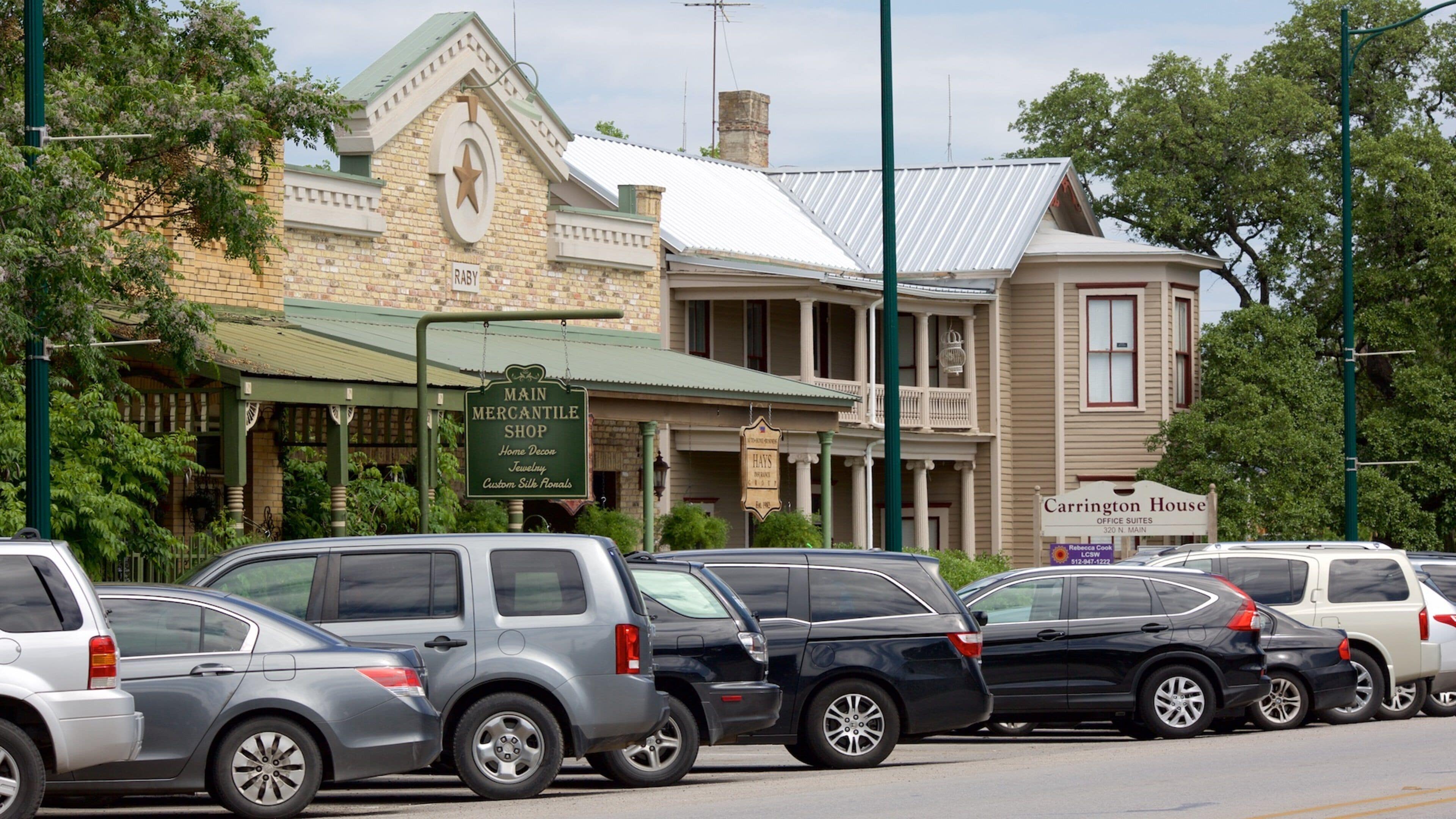 Buda which includes a small town or village