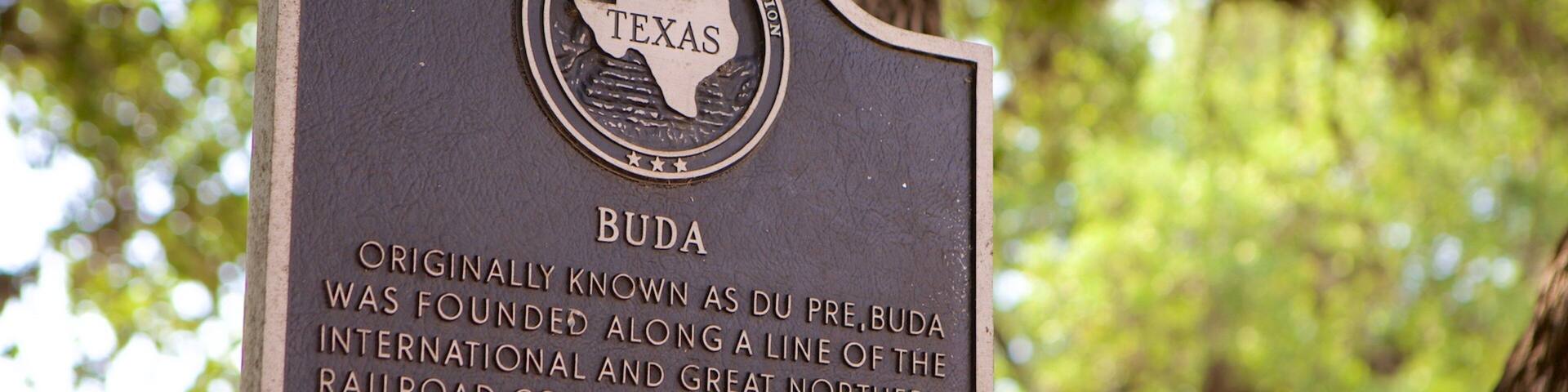 Buda featuring signage