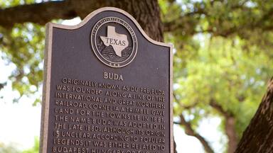 Buda featuring signage