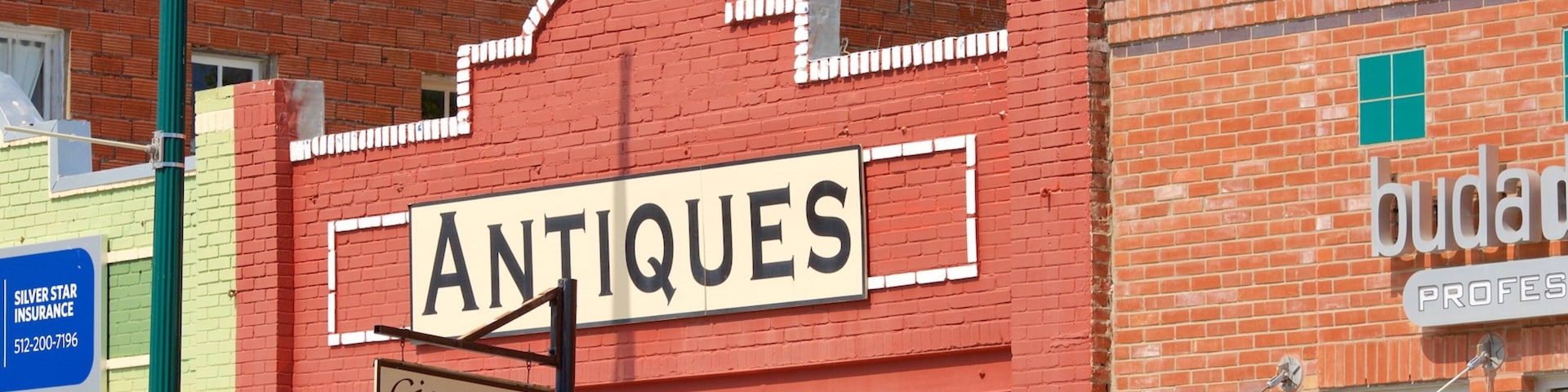 Buda featuring signage