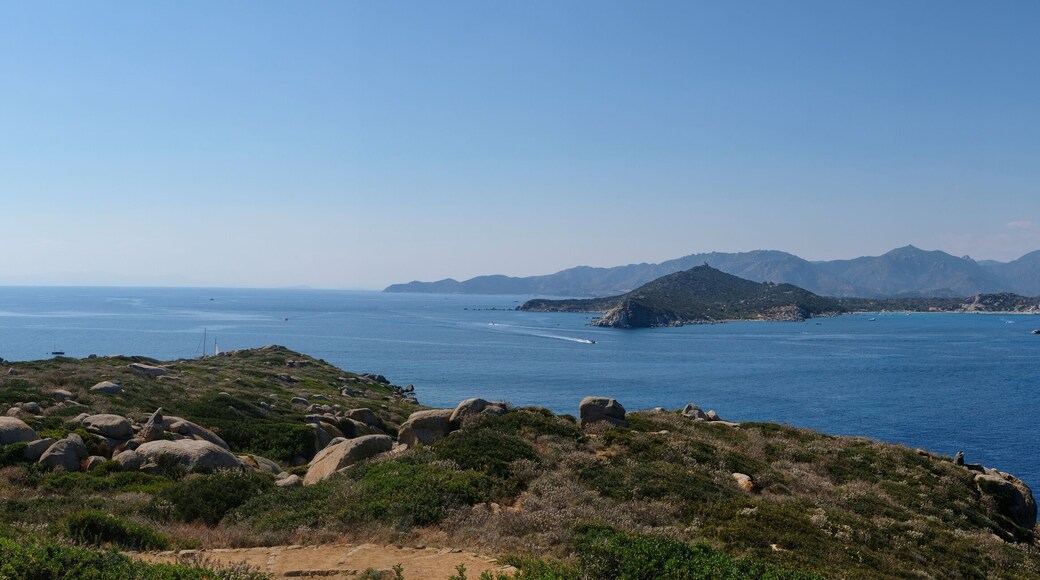 panorama of the lighthouse in the cabbage islands (isola dei cavoli) - with sails boat - Cagliari Sardinia.