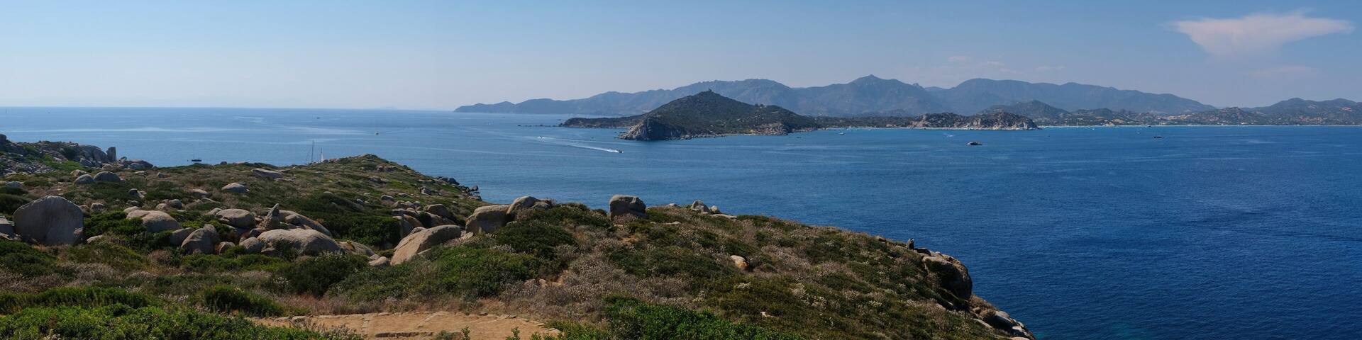 panorama of the lighthouse in the cabbage islands (isola dei cavoli) - with sails boat - Cagliari Sardinia.