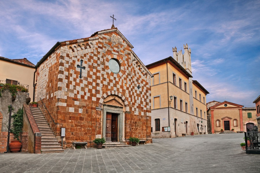 Trequanda, Siena, Tuscany, Italy: the ancient square with the medieval church and the town hall in the old town of the Tuscan village; Shutterstock ID 1473406058; Purchase Order: -