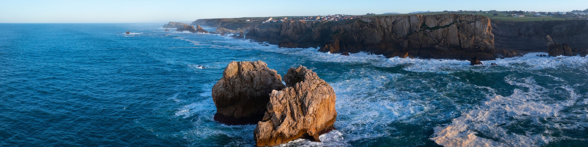 Aerial view from a drone of the Urro del Manzano mountain range in the Costa Quebrada Geopark. Liencres, Cantabrian Sea, Cantabria, Spain, Europe
