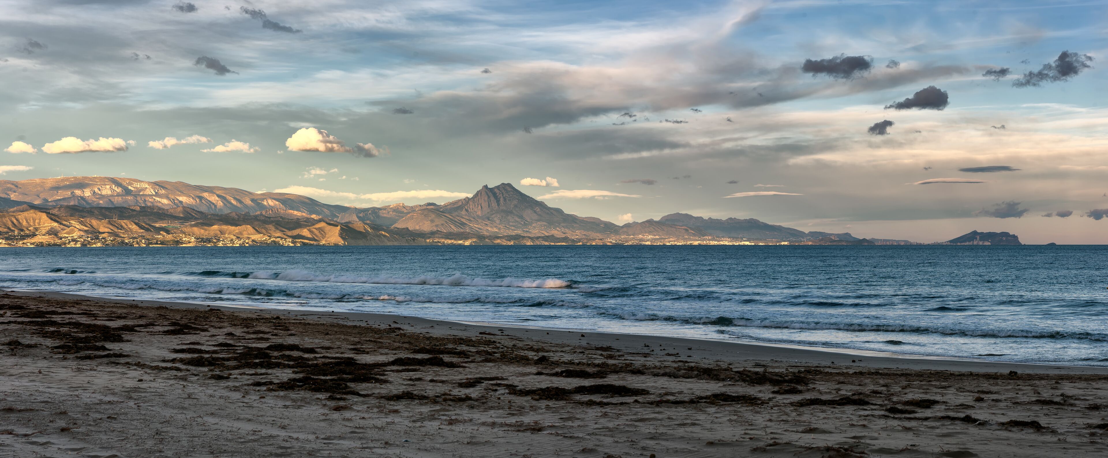 Panoramic view of San Juan beach in Alicante, Spain at sunset