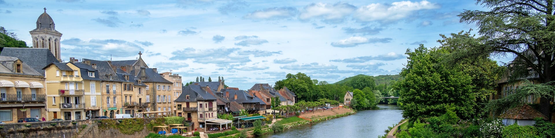 View over the Vézère River onto the old town of Montignac-Lascaux in Perigord, France