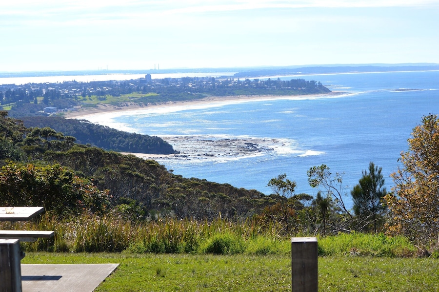 A sensational place to pull out the picnic rug.
Views are across to The Entrance and up to Norah Head and beyond.  
A popular place to spot the whales migrating.  Also a great little spot to see the local dolphins and the other flora and fauna.  A stunning walk up the coastline too.
One of those 'Local' kept secrets....