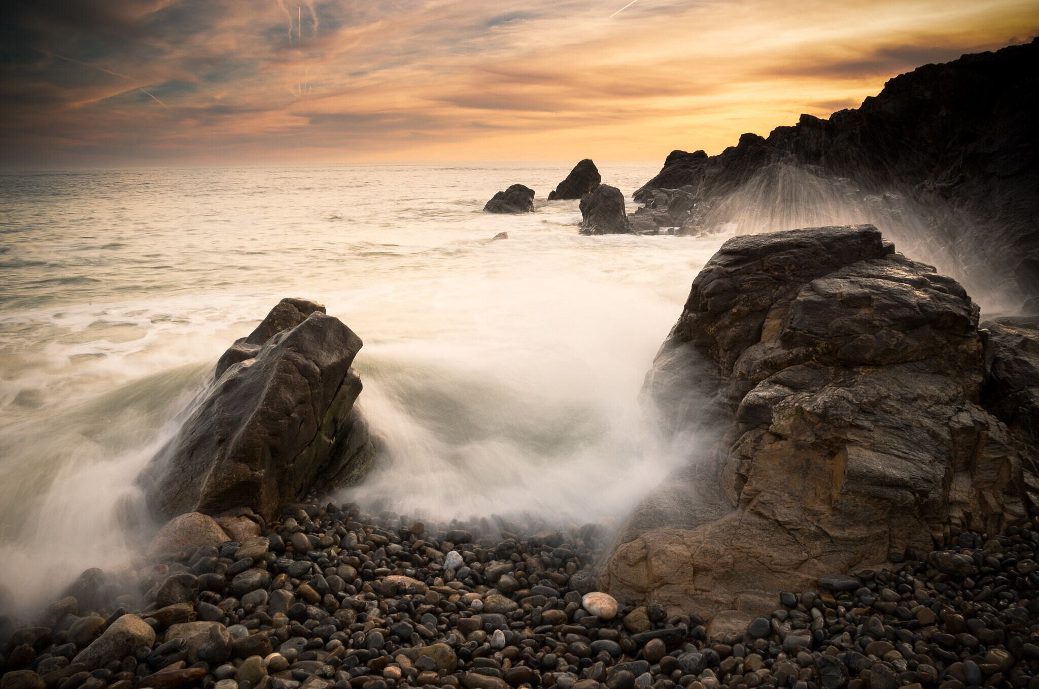 500px provided description: Rocky spot at high tide along Cayola Bay, Les Sables d'Olonne, Vend?e (France) [#sea ,#sunset ,#ocean ,#waves ,#rocks ,#seascape ,#tide ,#long exposure ,#France ,#Vend?e]