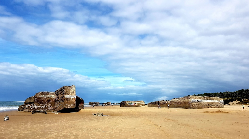 Long beautiful beach with remaining bunkers from WW2.