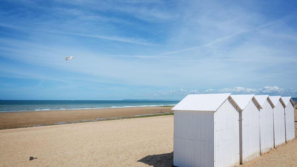 Traditional white wooden beach cabins on the beach of Villers, Normandy, France; Shutterstock ID 663508384; Purchase Order: SP-1394 HA Batch 3 Part 1; Order Number: ; Client/Licensee: HomeAway; Other: