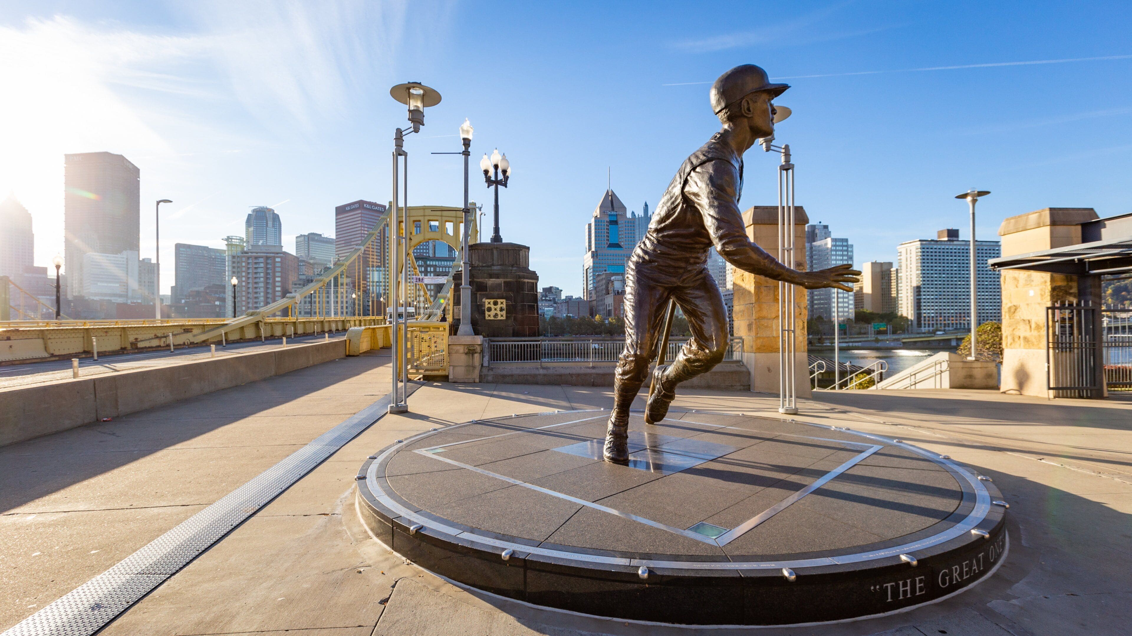 PNC Park featuring a bridge, a sunset and a city
