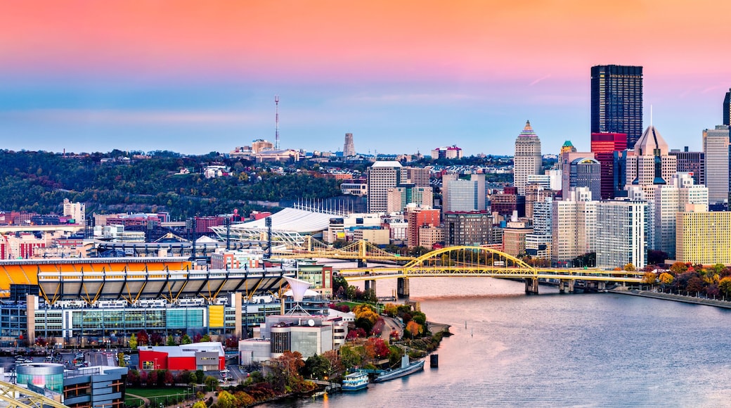 Pittsburgh, Pennsylvania skyline at sunset and the famous baseball stadium across Allegheny river