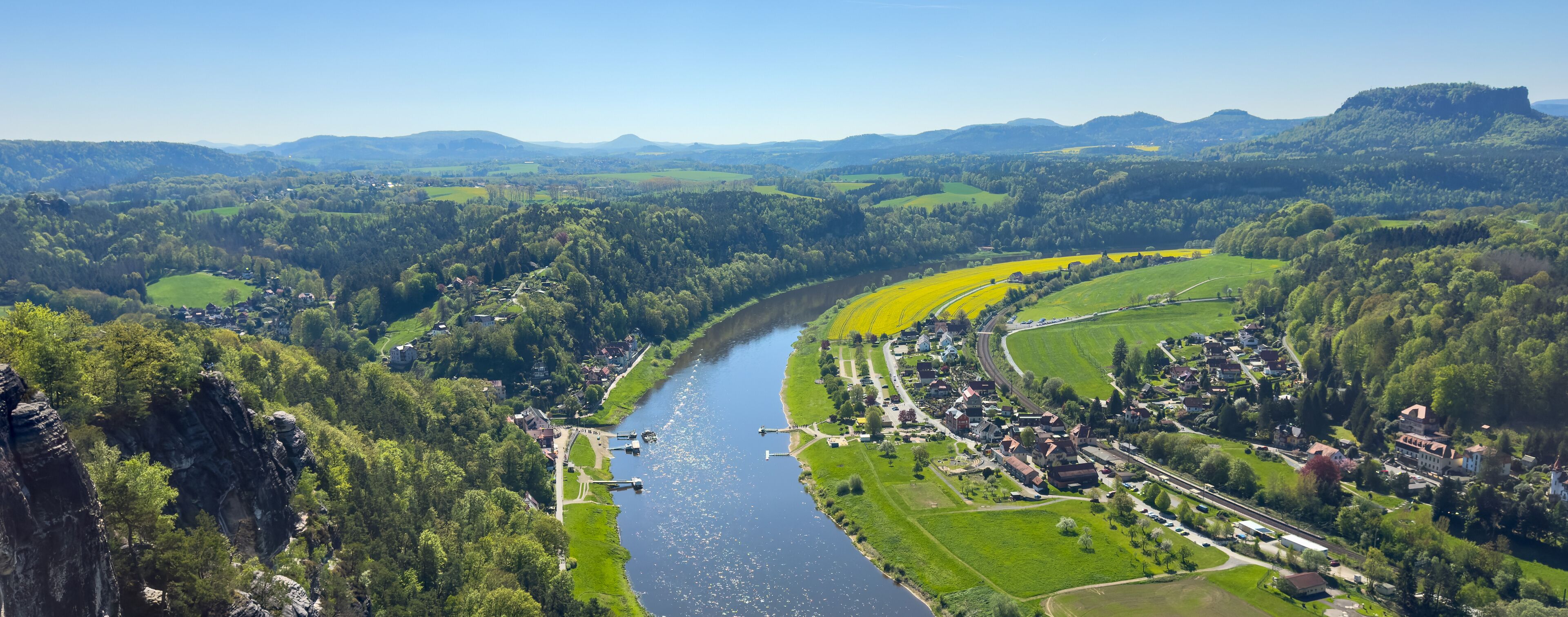aerial view of rural village rathen in the elbe sandstone mountains in east germany with the river elbe from the bastei area