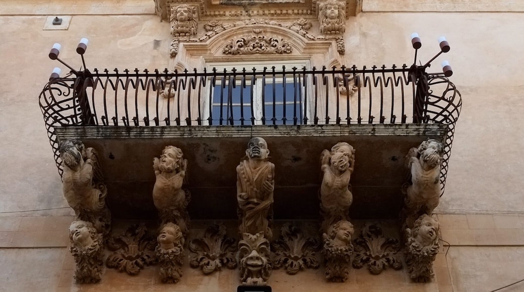 The striking facade of this 18th-century palace features wrought-iron balconies supported by a swirling pantomime of grotesque figures. Inside, the richly brocaded walls and frescoed ceilings offer an idea of the sumptuous lifestyle of Sicilian nobles, as brought to life in the Giuseppe Tomasi di Lampedusa novel Il Gattopardo