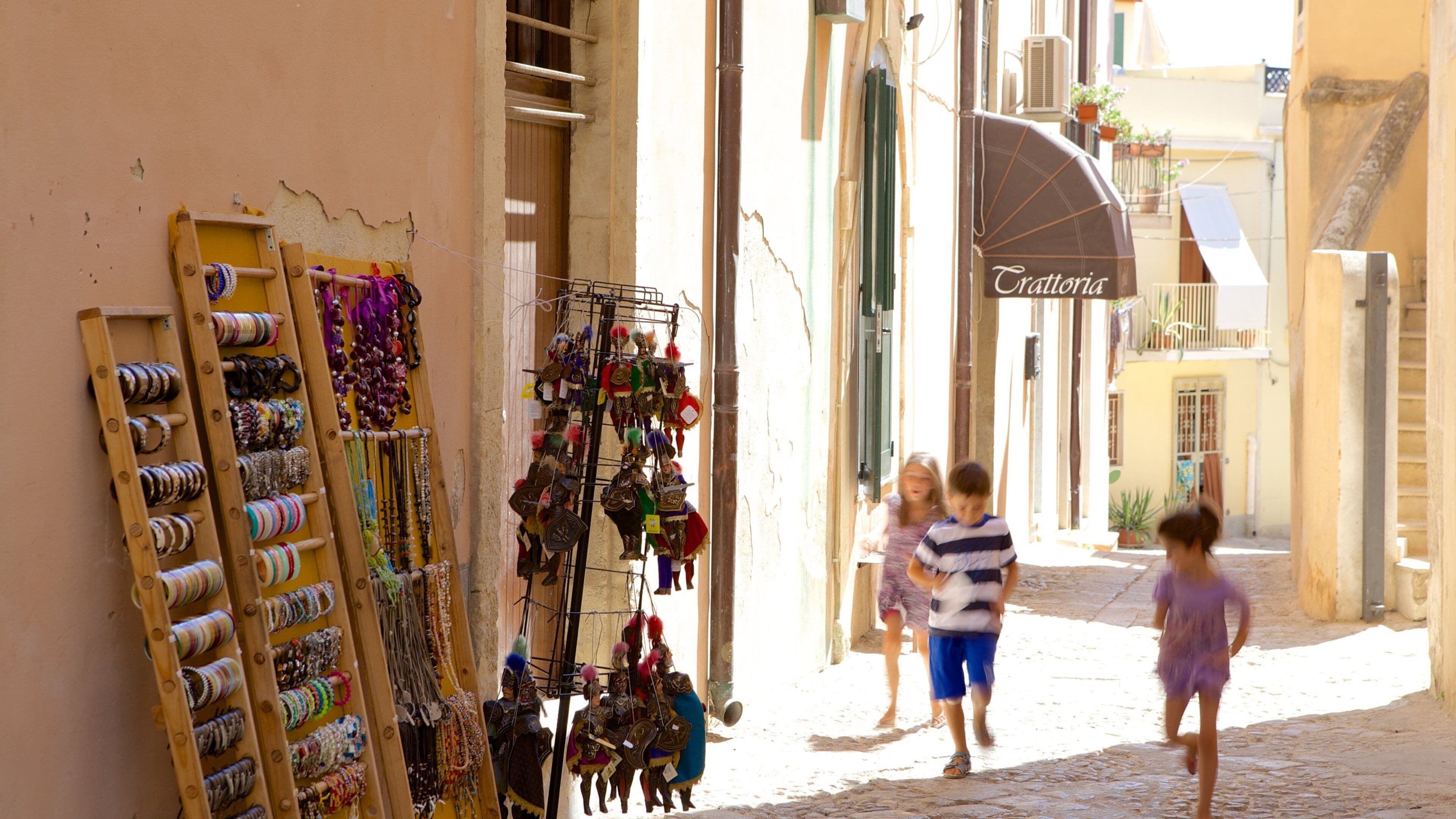 Noto featuring street scenes as well as children