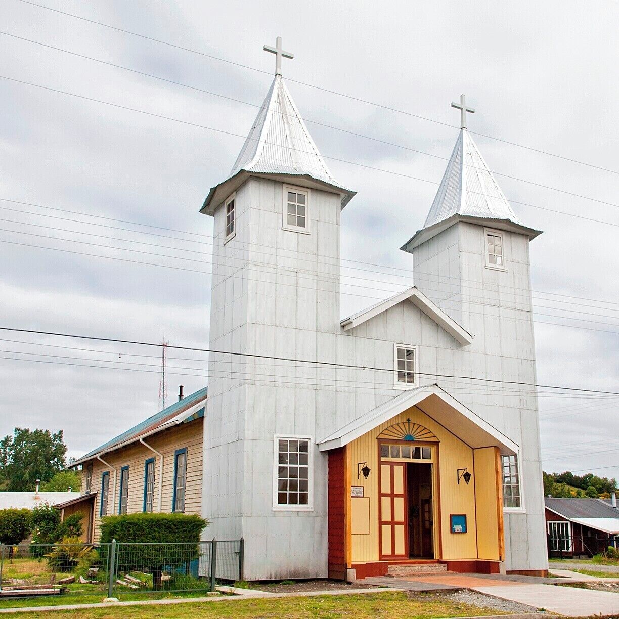 Although the Chiloé Archipelago is known for it's 18th and 19th century native timber churches (16 of them are UNESCO World Heritage Sites), this particular church is not on the list and isn't quite as iconic.  However, it still dates from 1710, and I felt that the metal sheeting nailed to the exterior made it eccentric enough for a photo.

#Architecture