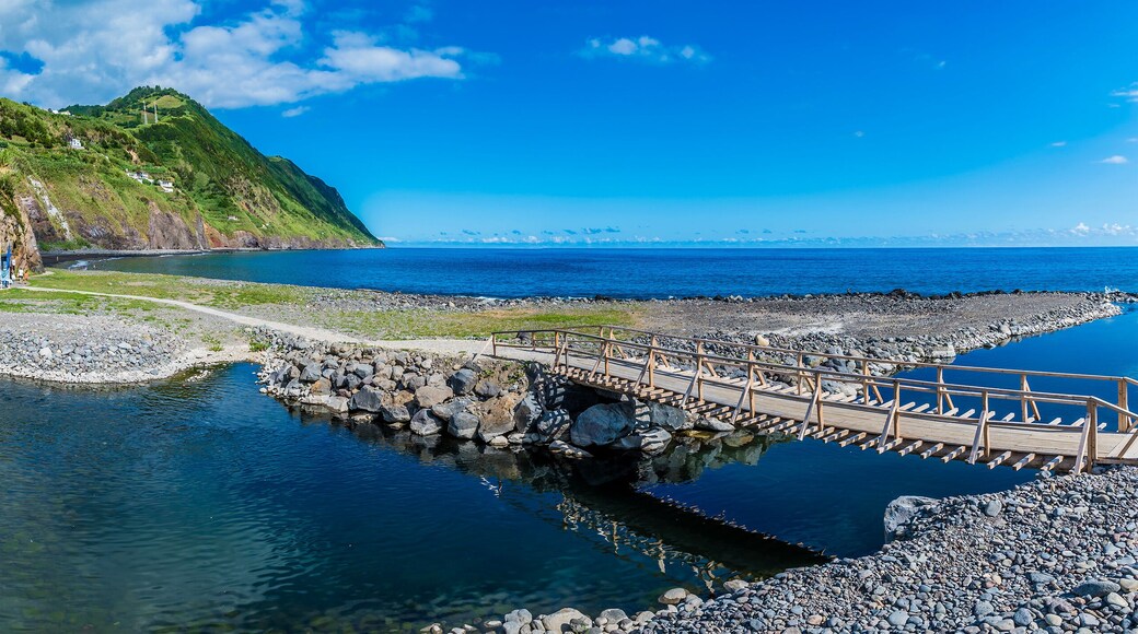 A panorama view along the shoreline in the town of Povoacao on the island of Sao Miguel in the Azores in summertime